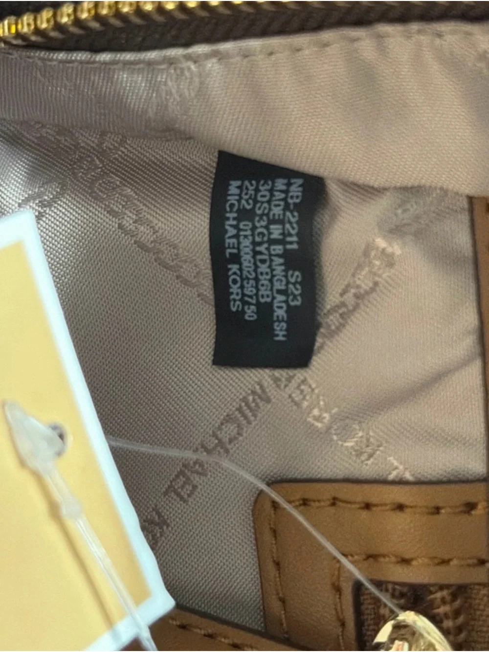 Michael Kors Brown Monogram Backpack with Tan Trim and Gold Hardware